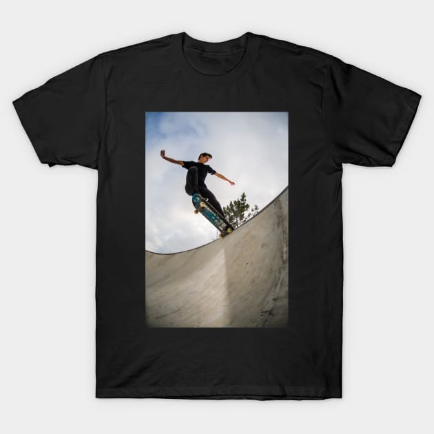 Skateboarder doing a tail slide T-Shirt by homydesign